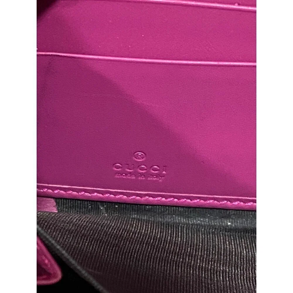 Gucci Guccissima Bow Zip Around Long Wallet in Fuschia